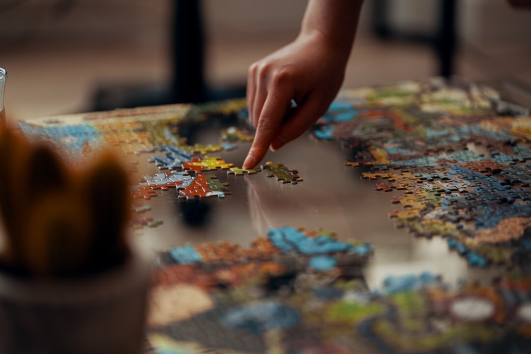 person solving puzzle